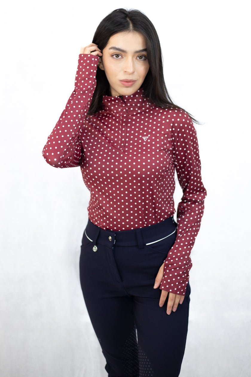 Polo de manga larga con lunares de Cleo W