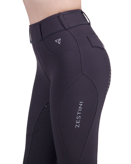 Dark purple riding pants with Zestini branding on a white background